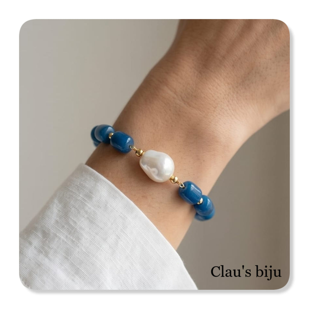 Bracelet with blue stones and steel pieces.