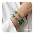 Pulseiras com pedras olho de gato verdes, com peças banhadas a ouro