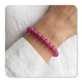 Pulseira em aço com pedras fushia e fecho ajustável
