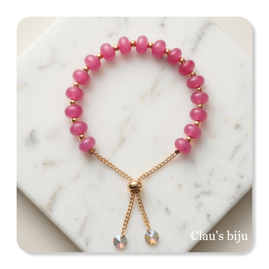 Pulseira em aço com pedras fushia e fecho ajustável