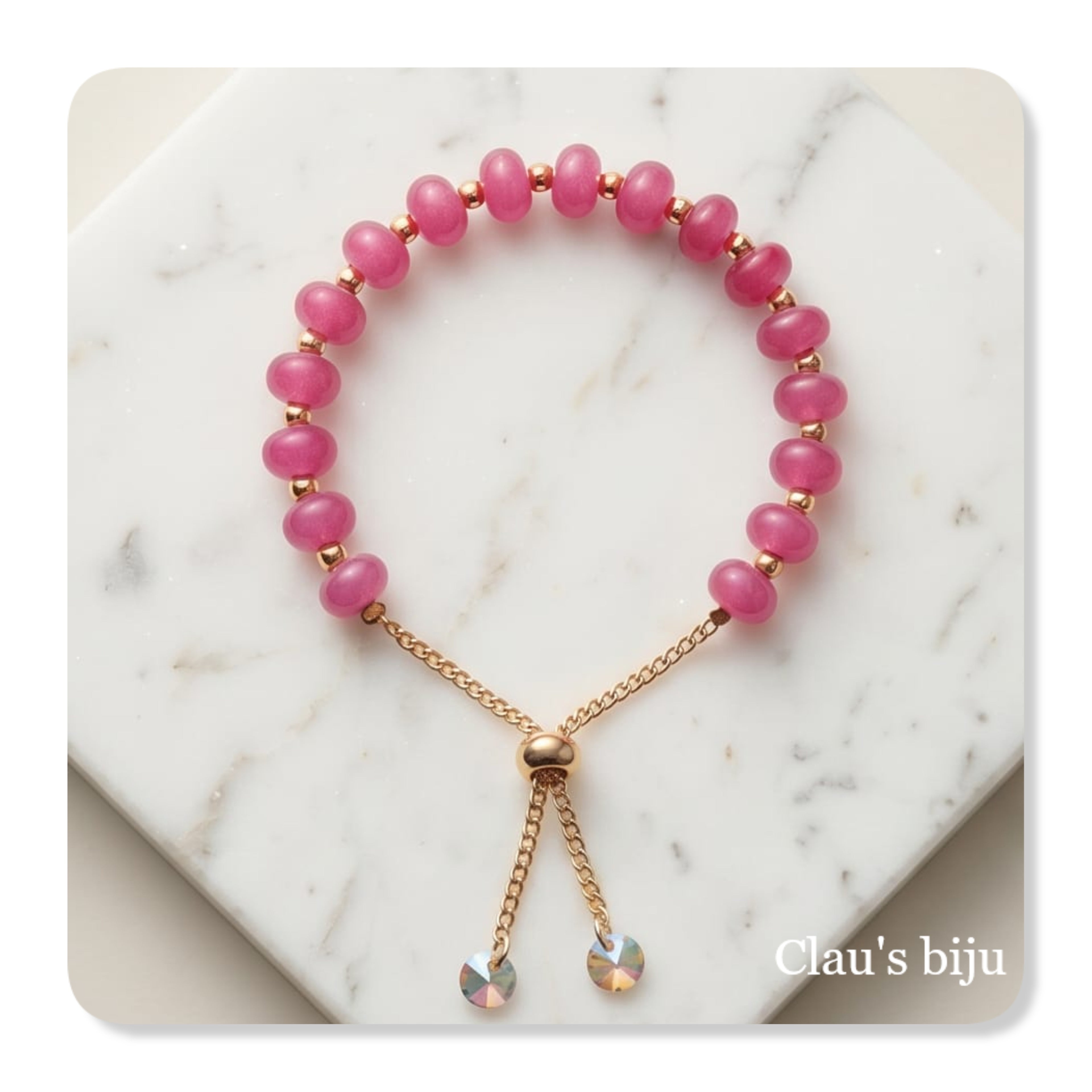 Pulseira em aço com pedras fushia e fecho ajustável
