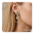 Boucles d'oreilles plaquées or 18 carats.