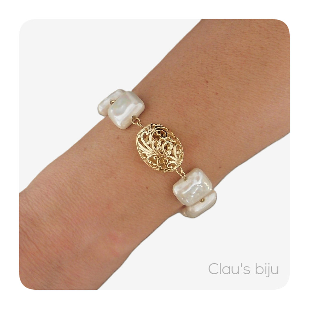 Pulseira com peça banhada a ouro