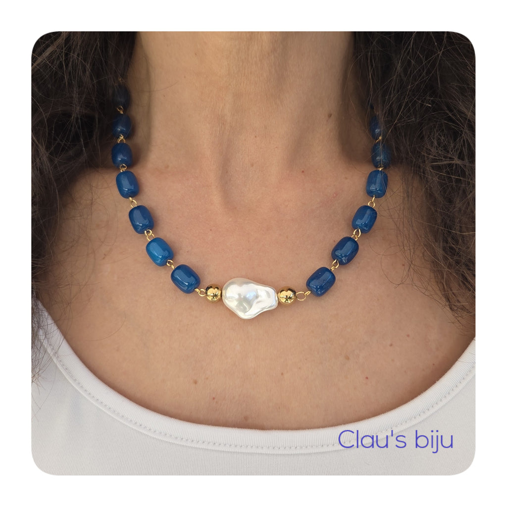 Necklace with blue stones and steel pieces.