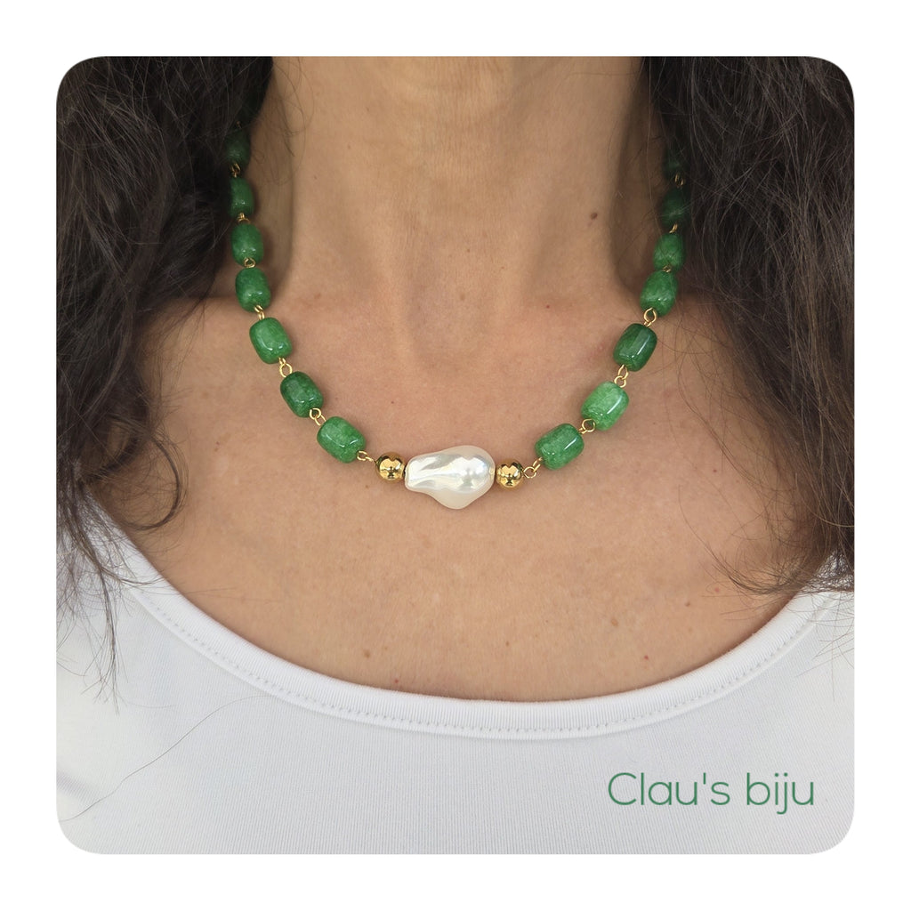 Necklace with green stones and steel parts.