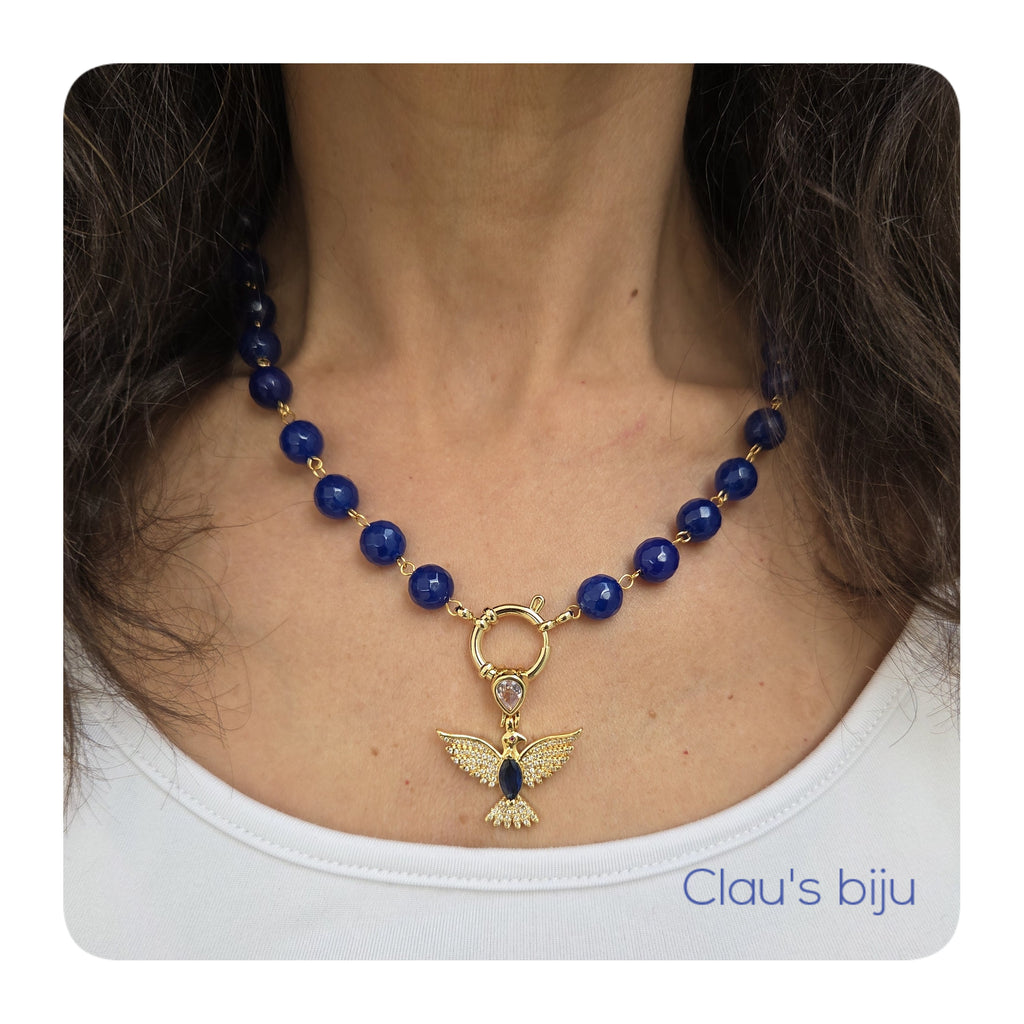 Necklace with blue stones and steel pieces.