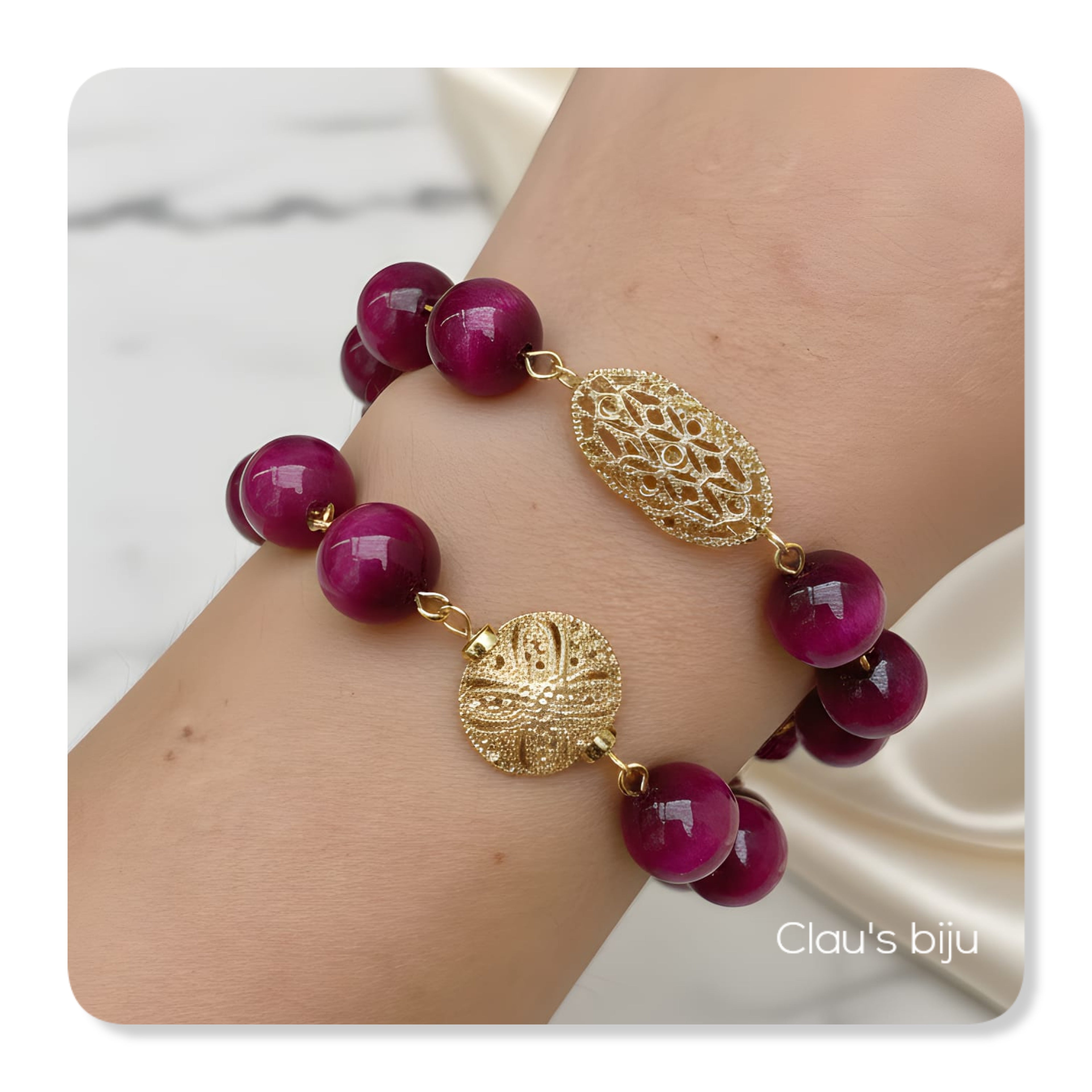 Bracelets with pink tiger's eye stones, with an 18-karat gold-plated piece.