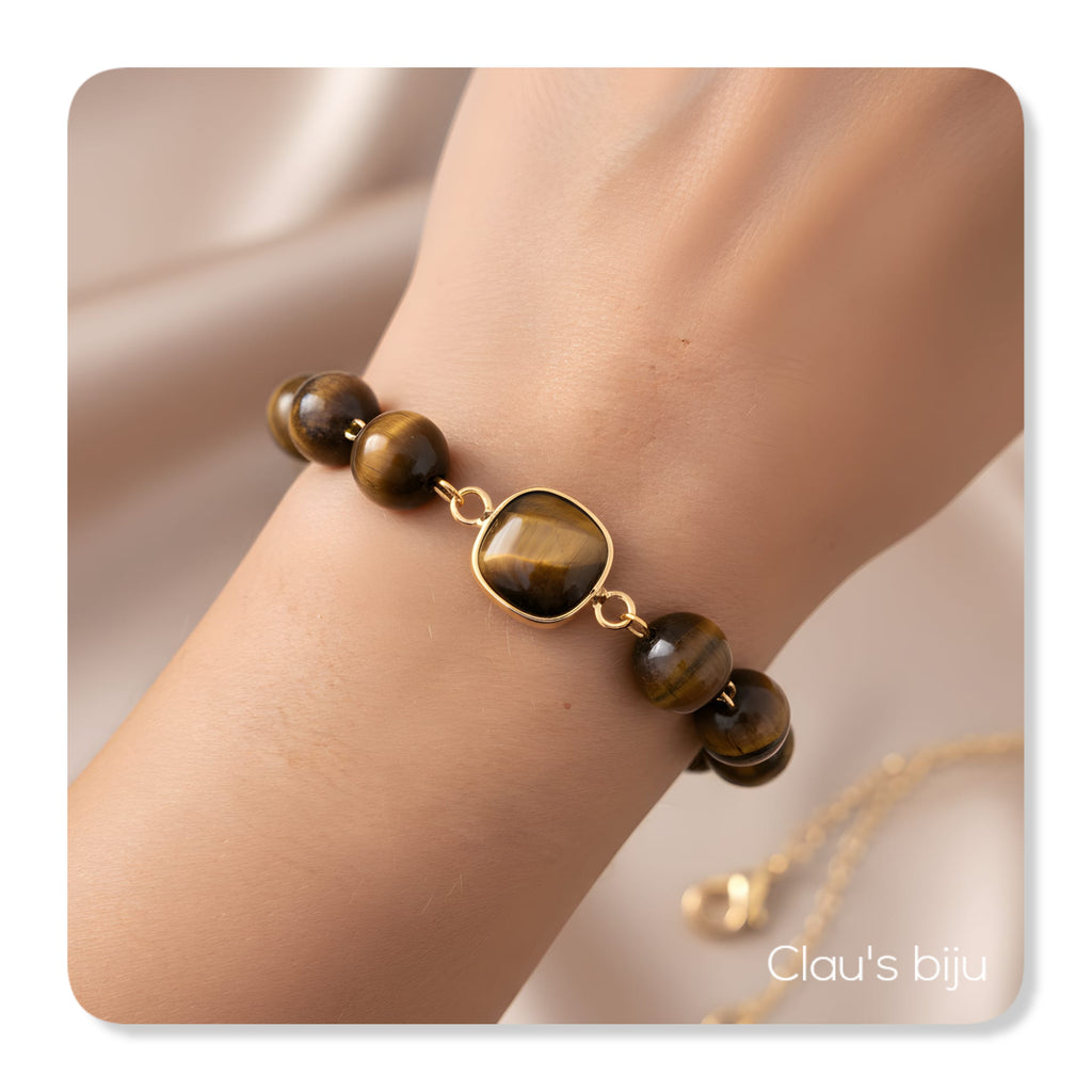 Necklace with tiger's eye stones and steel components.