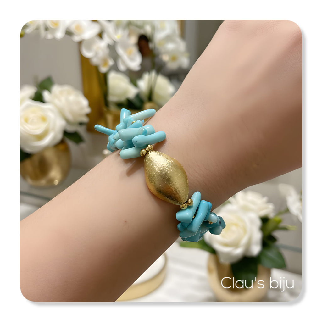 Bracelet with gold-plated pieces.