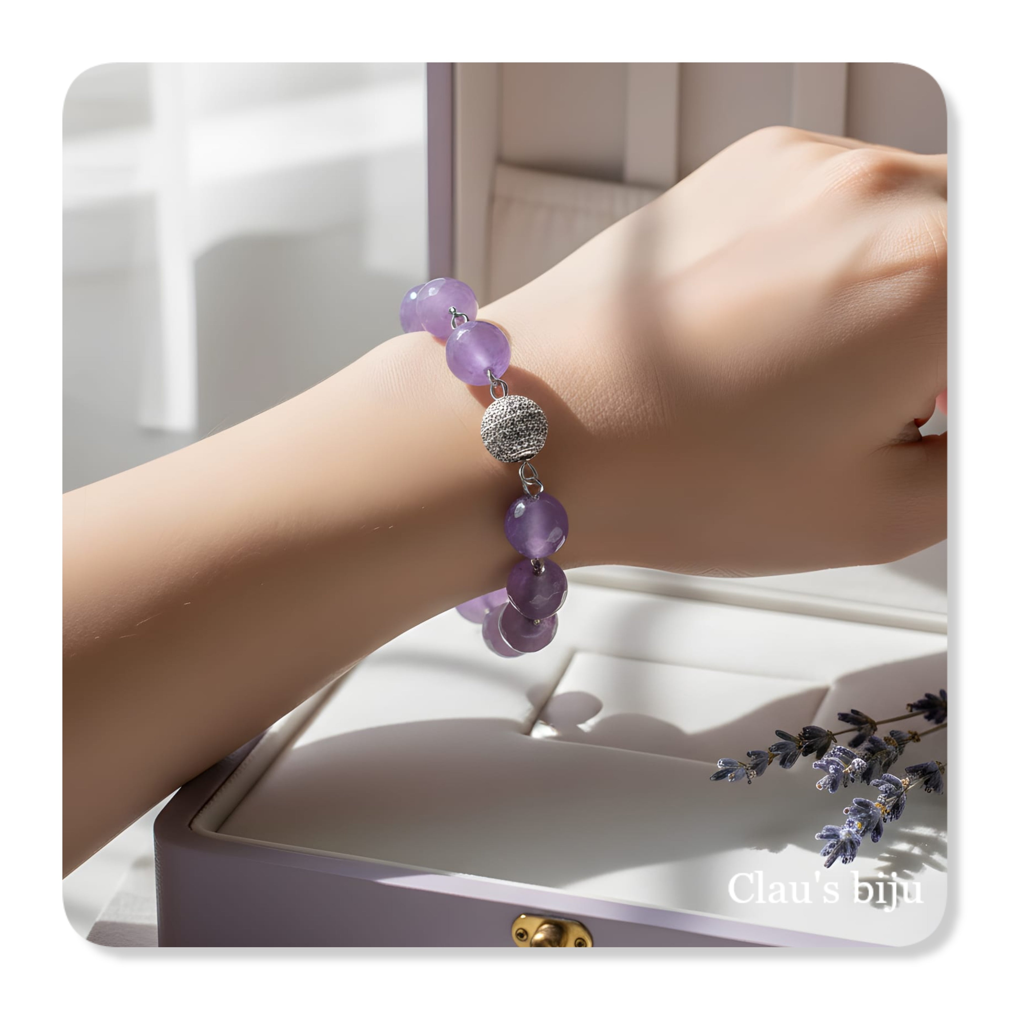 Bracelet with lilac stones and steel components.