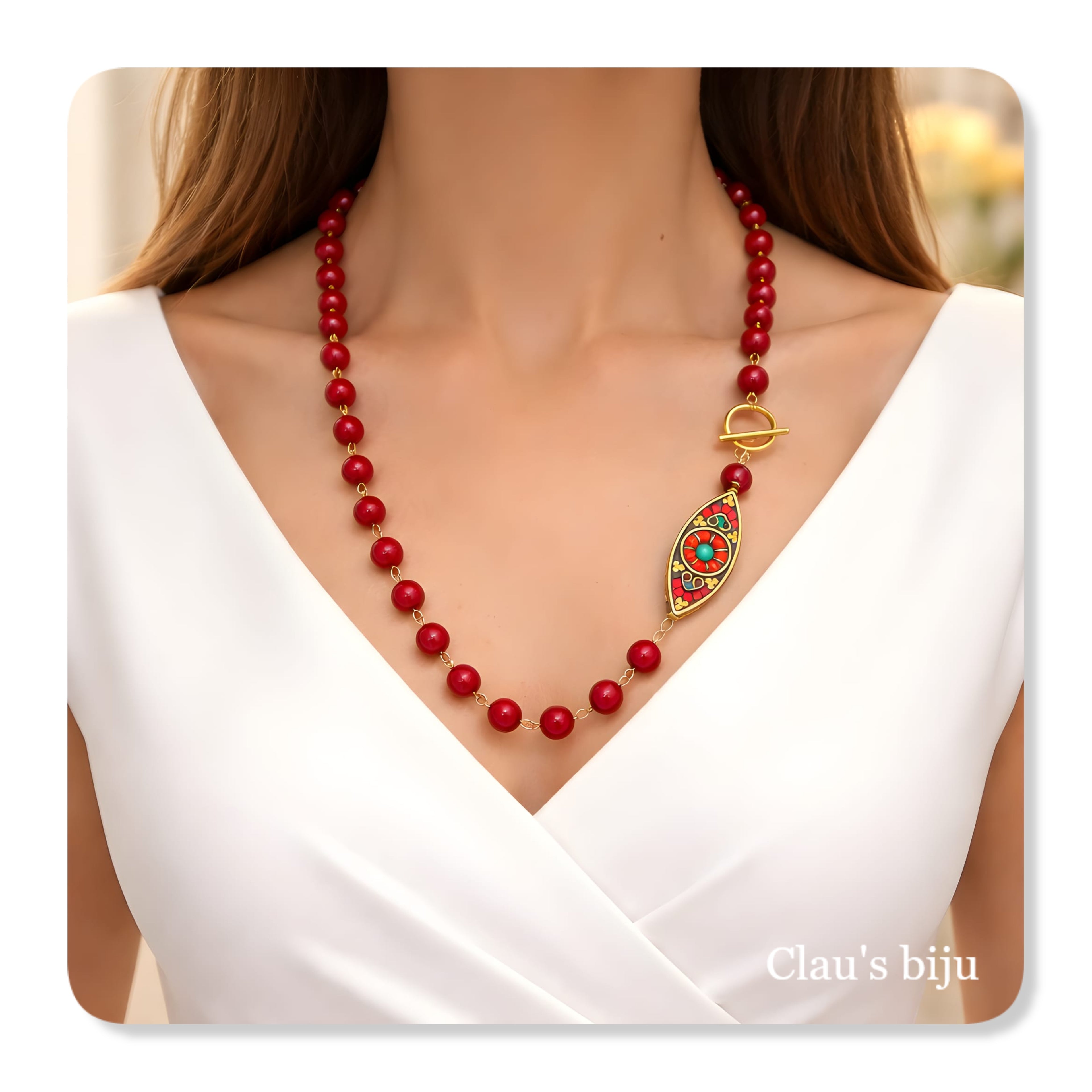 Colar com pedras vermelhas e peça tibetana