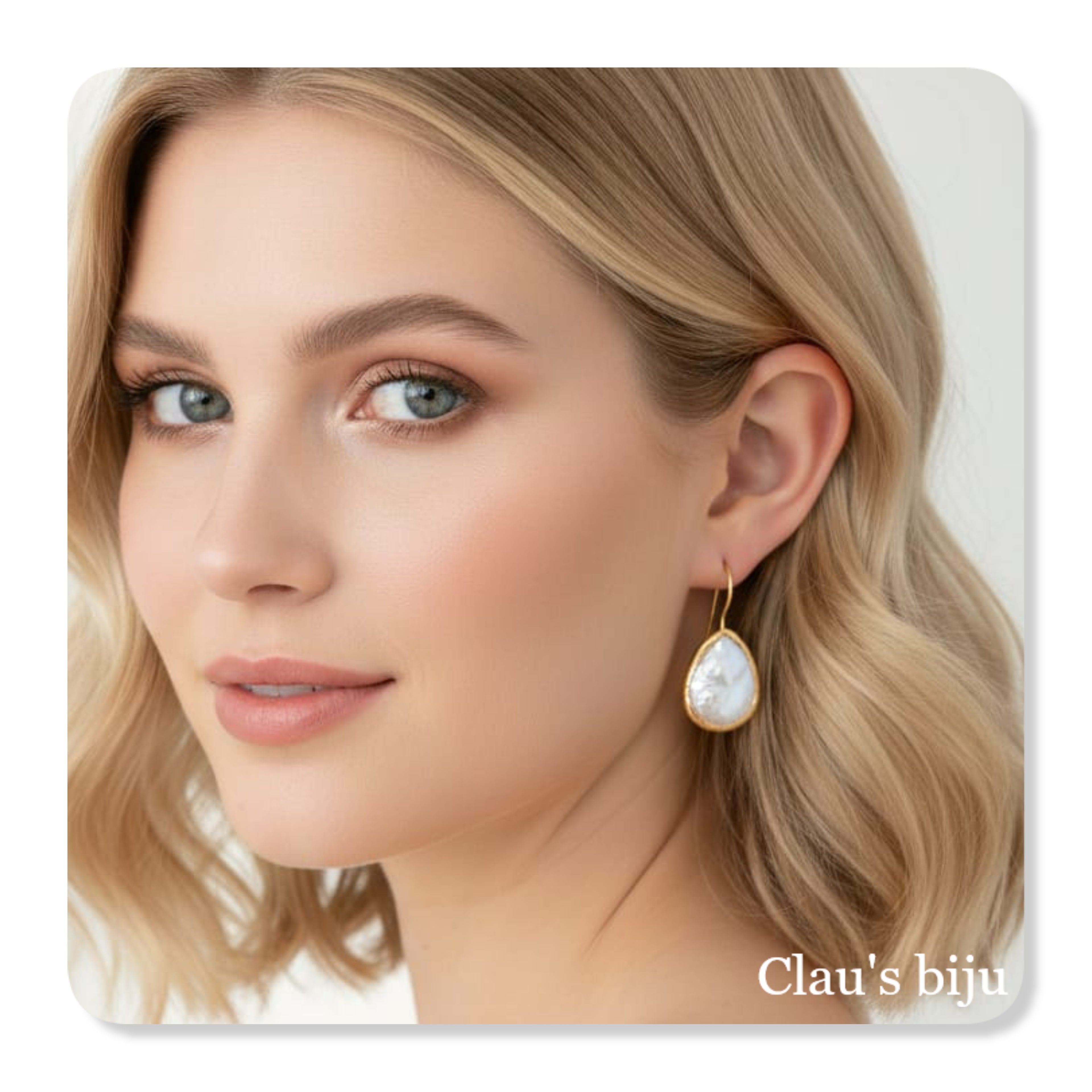 Brincos com pérola barroca, banhados a ouro de 18 quilates