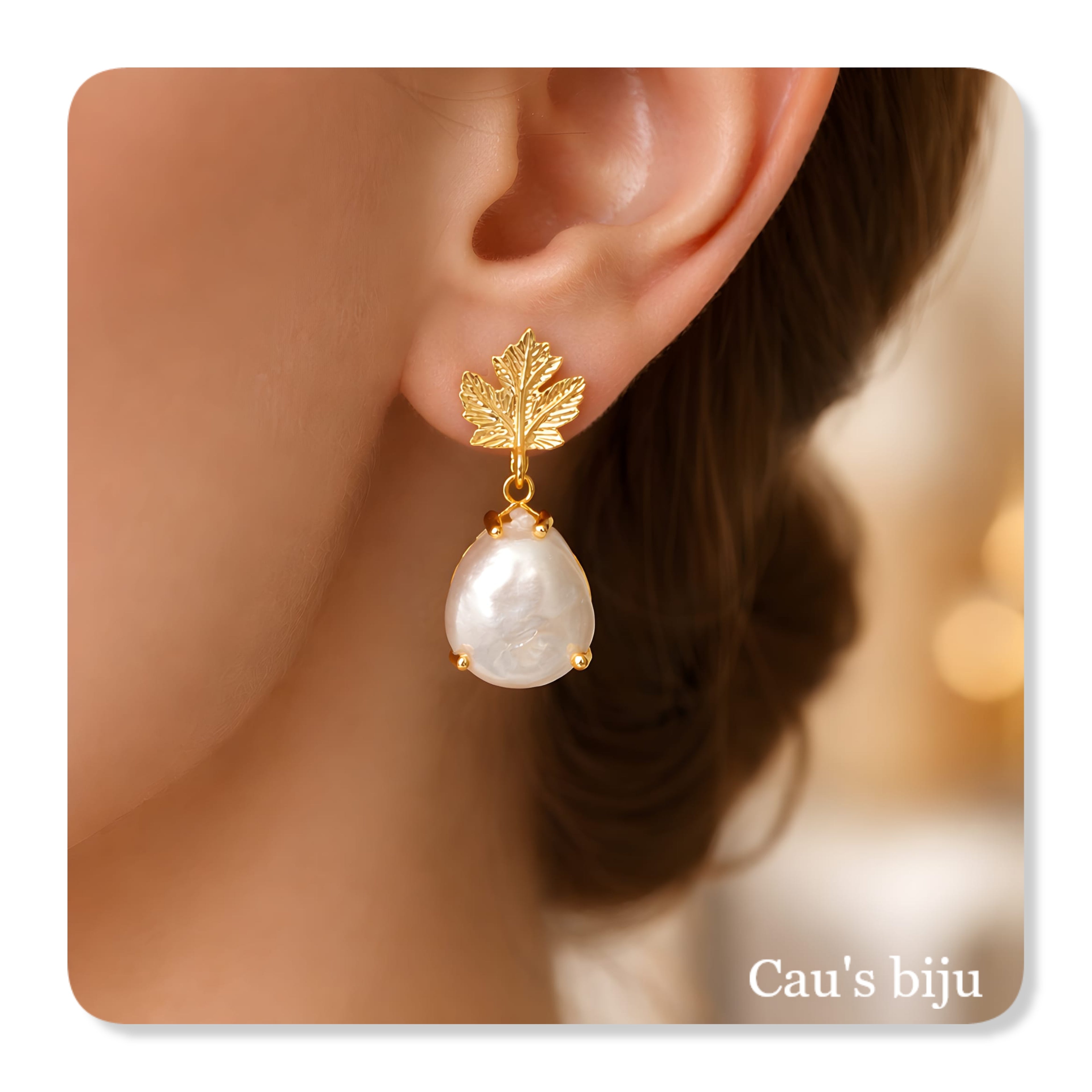 Brincos com pérola barroca, banhadas a ouro de 18 quilates
