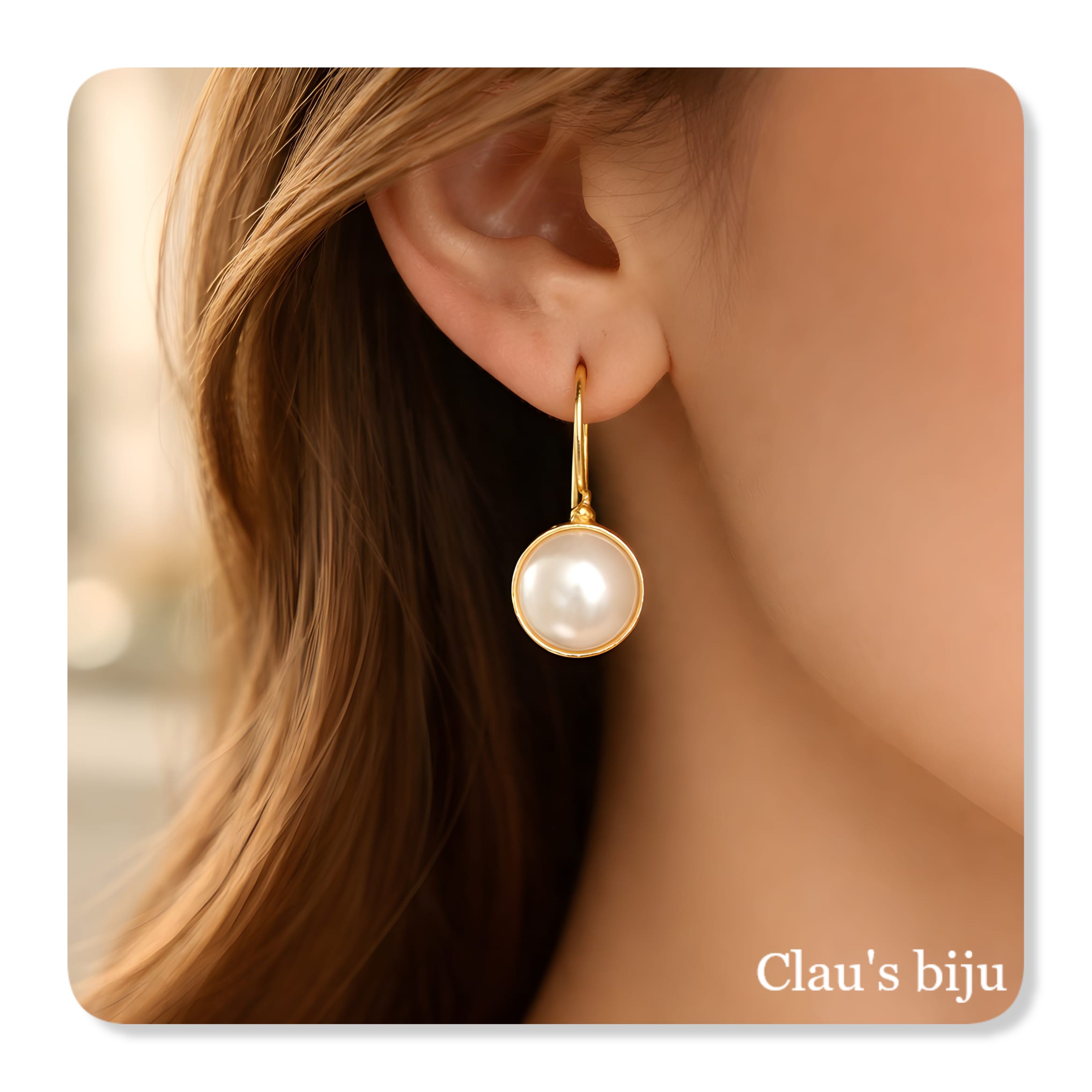 Brincos com pérola barroca, banhados a ouro de 18 quilates