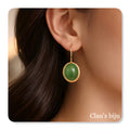 Brincos com pedra olho de gato verde, banhados a ouro de 18 quilates