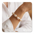 Bracelet de perles avec pièces en acier.