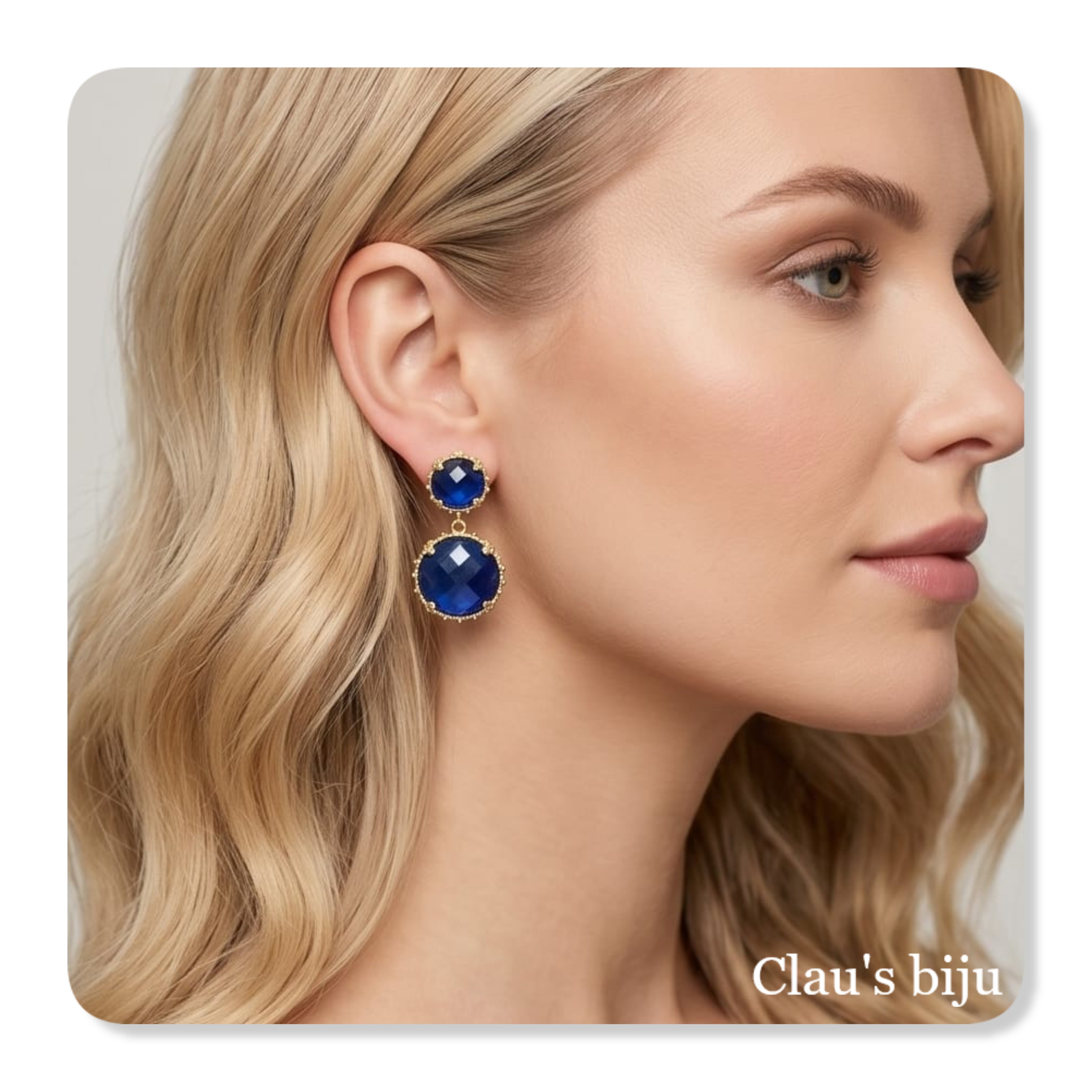 Earrings with blue stone, plated in 18 karat gold.
